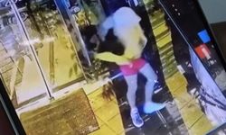 Kadın kılığına giren hırsız pembe şort ve sarı perukla mağaza soydu!