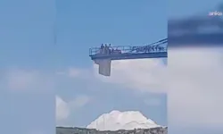Ücretlerini alamadıklarını öne süren işçiler kule vince çıktı