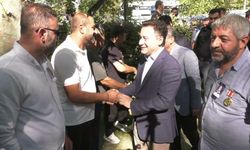 Babacan'dan oturma eylemindeki şehit aileleri ve gazilere destek